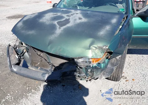 1999 Ford Escort Lx from USA, damaged, VIN 1FAFP10P9XW186384